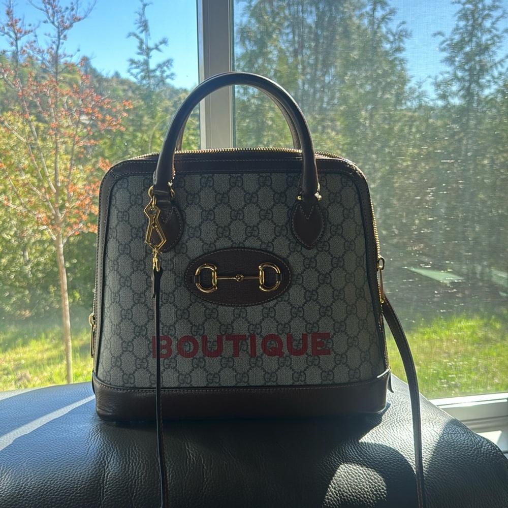 Gucci Horsebit 1955 Top Handle Bag Printed GG
Coated Canvas and Leather Medium